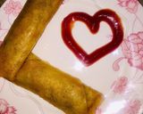 A picture of step 21 of Chicken vegetable roll.