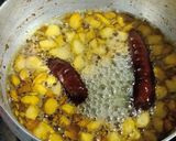 A picture of step 2 of Dahi Tadka.