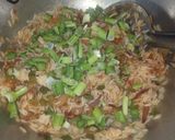 A picture of step 3 of Leftover schezwan onion pulao.