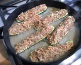 Une image de l'étape 19 de Courgettes farcies carotte jambon emmental.
