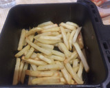 Foto del paso 7 de la receta: Lomos de merluza con pisto y patatas fritas Exprés
