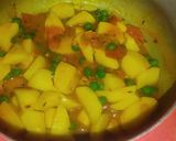 A picture of step 7 of Aloo matar.