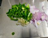 A picture of step 1 of Capsicum - Onion Sabzi.