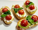 A picture of step 7 of Toasts with Cottage Cheese, Cherry Tomatoes, Guacamole, and More.