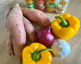 A picture of step 1 of Roasted Sweet Potatoes with Spices, Yellow Peppers, and Oven-Roasted Garlic.
