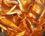 A picture of step 4 of Crab curry.