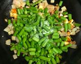 A picture of step 1 of Beans Bharta.