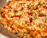 Foto del paso 4 de la receta: Pizza de atún con base de calabacín