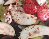 A picture of step 4 of Baked Brinjals and Papers.