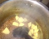 A picture of step 4 of Qeema with mix veg.