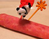 A picture of step 4 of Super Easy! Cucumber Wrapped in Bologna.