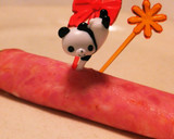 A picture of step 4 of Super Easy! Cucumber Wrapped in Bologna.