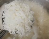 A picture of step 3 of Chullo kabab with butter rice.