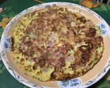 Une image de l'étape 12 de Omelette au jambon cru, oignon et herbes.