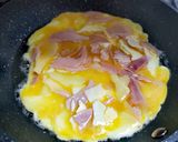 Foto del paso 4 de la receta Tortilla con jamón y queso