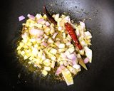 A picture of step 3 of Pui Shake Diye Bhaja Muger Dal (Roasted Moong Dal Cooked With Malabar Spinach - Bong Style).
