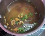 A picture of step 2 of Traditional Indian Medicine or Kadha.