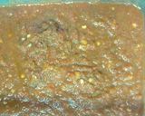 A picture of step 3 of Ofada rice served with ofada sauce also known as ayamase.