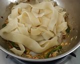 A picture of step 5 of Homemade capsicum Fattuccine pasta.