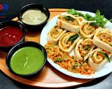 A picture of step 4 of Veg. Suji Rolls.