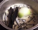 A picture of step 10 of Rich Chicken Paitan Niboshi Ramen.