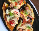 A picture of step 7 of Instant Rava pizza.