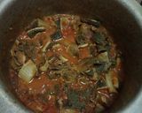 A picture of step 1 of Stripes(matumbo) with greens and ugali.