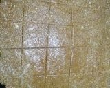 A picture of step 6 of Ground Til Coconut Mix Chikki.