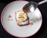 A picture of step 3 of Tuc Egg Canapes.
