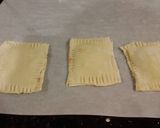 A picture of step 9 of Raspberry White Chocolate Pastry Strudels.