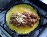Foto del paso 5 de la receta: Chistorra con huevo, cebolla caramelizada y papas fritas