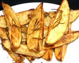 Foto del paso 3 de la receta: Gajos de papas rústicas asadas al romero