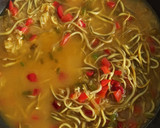 Foto del paso 3 de la receta: Arroz basmati al curry con gulas y almejas
