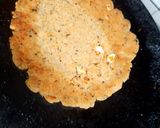A picture of step 2 of Leftover upma pizza.