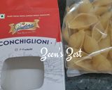 A picture of step 1 of Conchiglioni Pasta with Spinach and Cheese.