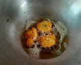 A picture of step 3 of Macher Dimer Borar Tok Jhol (Fish Roe Fritters in Tangy Curry).