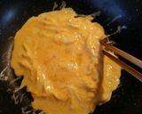 A picture of step 3 of Fluffy and Creamy Omurice with Mushroom Demi-Glace Sauce.
