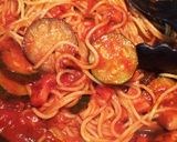 A picture of step 7 of Eggplant and Zucchini Bacon Tomato Pasta.