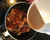 A picture of step 3 of Baked Mussakhan on bread.