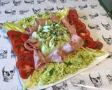 Une image de l'étape 11 de Salade d'endives tomates et courgette râpée à la mortadelle.