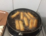 A picture of step 8 of Cheat Day Crispy pork spring rolls.