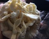 A picture of step 2 of Tlacoyos Stuffed with Quesillo.