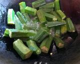 A picture of step 2 of Bhindi and Shallots Masala.