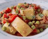 A picture of step 4 of Aloo Matar gajar.