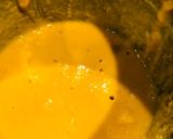 A picture of step 2 of Turmeric orange juice.