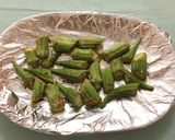 A picture of step 2 of Easy Italian-Style Roasted Okra.