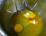 A picture of step 2 of 4 in 1 orange mousse sponge cake.