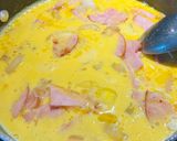 A picture of step 3 of Eggs with Canadian Bacon.