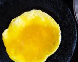 A picture of step 5 of Scrambled egg.(with dress of tomato rose).
