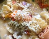 A picture of step 4 of White sauce pasta with multiple pasta.